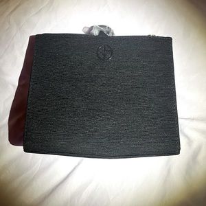 Giorgio Armani beauty bag or wrist clutch.